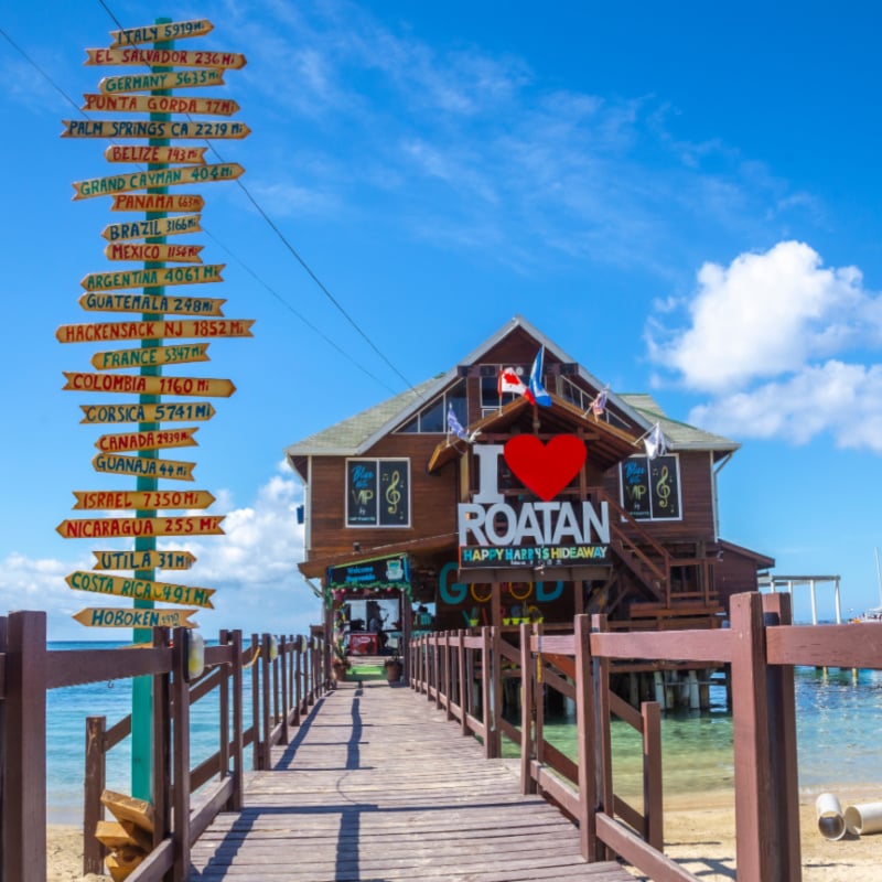 A wooden Bar over the sea on West End Beach on Roatan Island