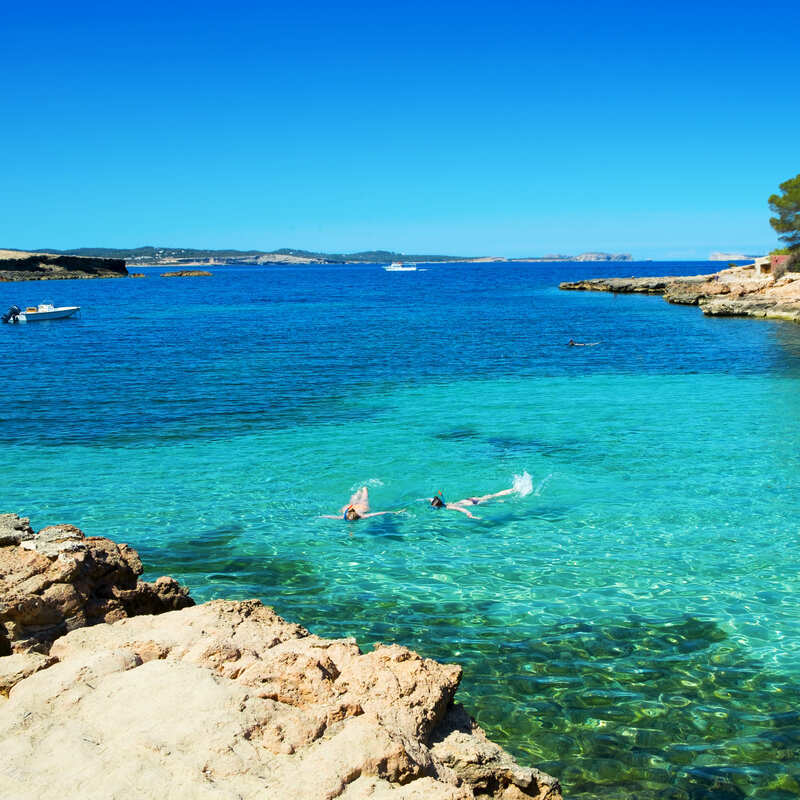 Swimmer Enjoying A Beach Day At Sant Antoni De Portmany, Ibiza, Spain, Mediterranean Sea