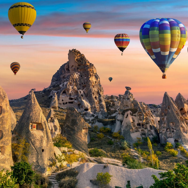 hot air balloons flying over Cappadocia, Turkey