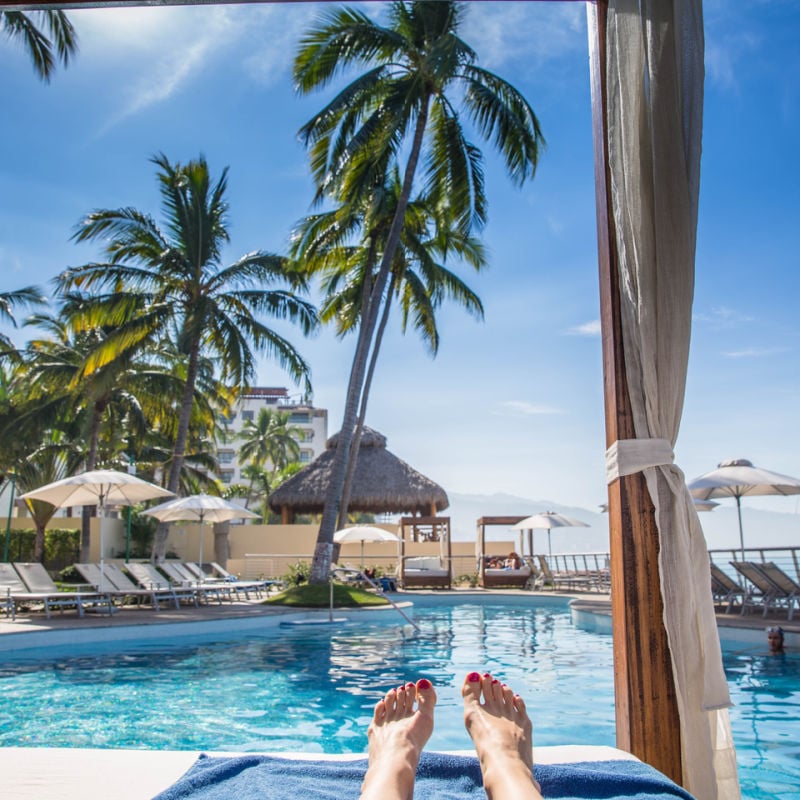lounging-at-resort-pool-in-Cancun