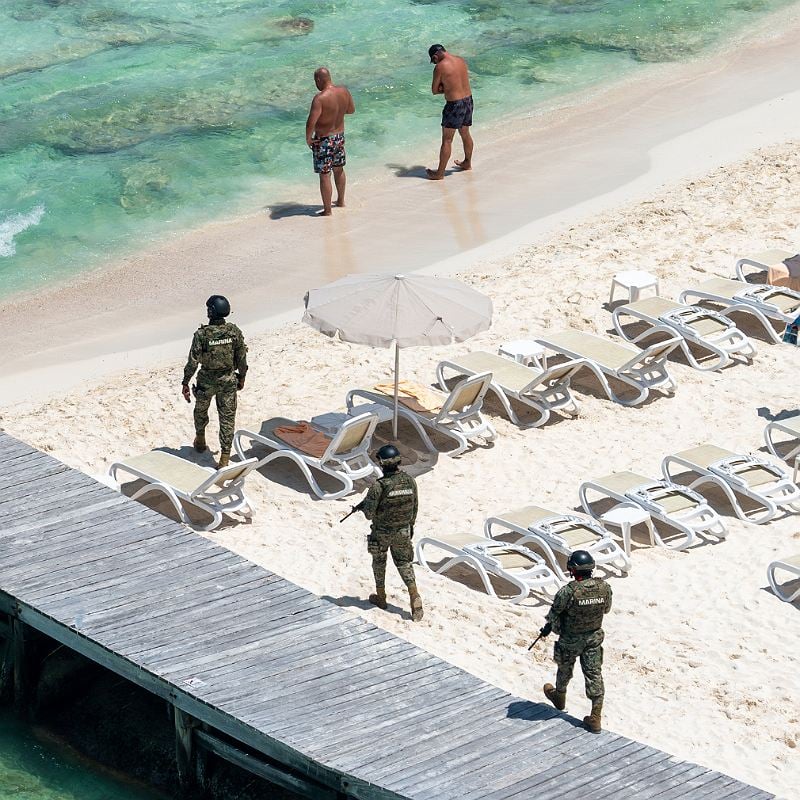 Mexico Police Patrolling A Beach In Cancun, Mexican Caribbean, Mexico