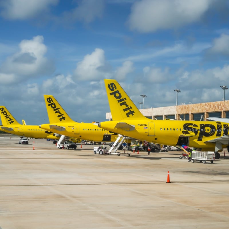 Spirit Planes Parked At The Tarmac In Cancun International Airport, Mexico