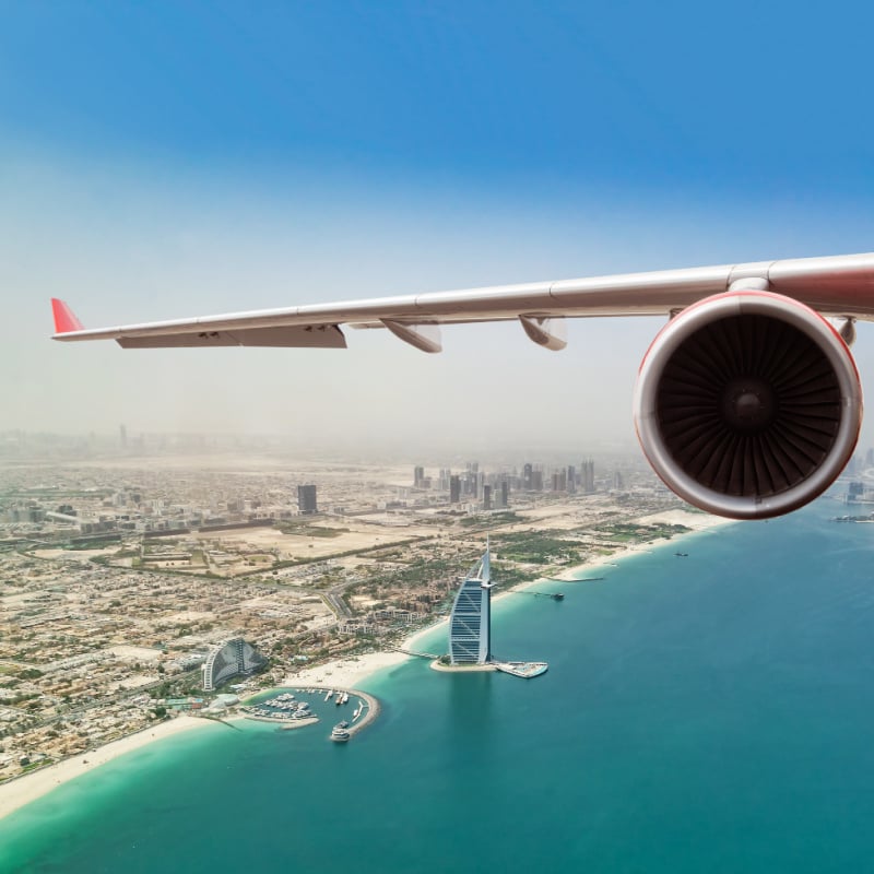 plane flying over Dubai