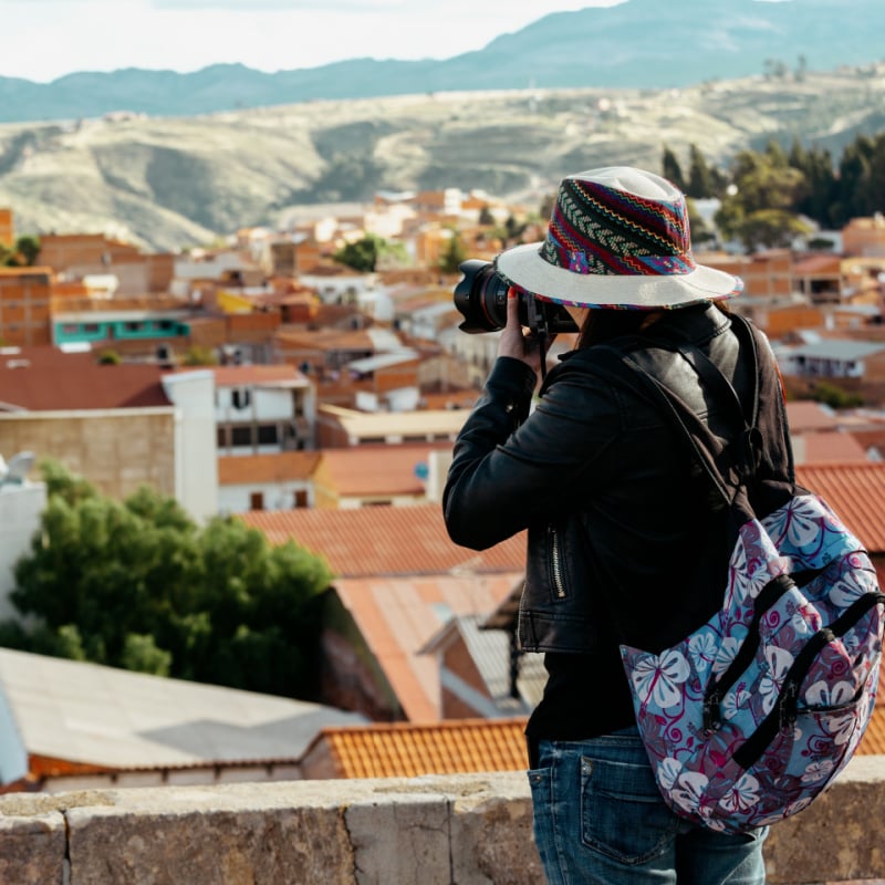 woman taking photos in sucre bolivia