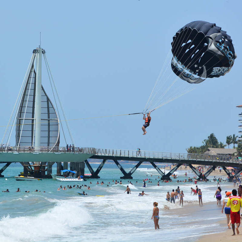 A Busy Sandy Beach In Puerto Vallarta, Near The Malecon Boardwalk, Jalisco, Mexico