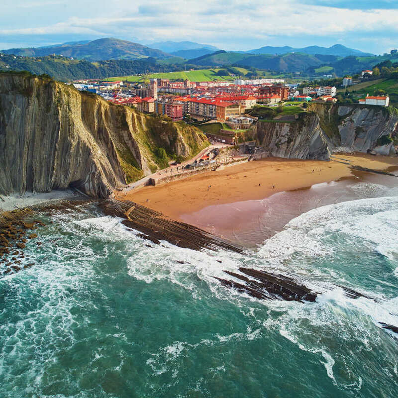 Aerial Drone Shot Of A Famous Beach In Basque Country, Northern Spain, Iberian Peninsula Of Europe