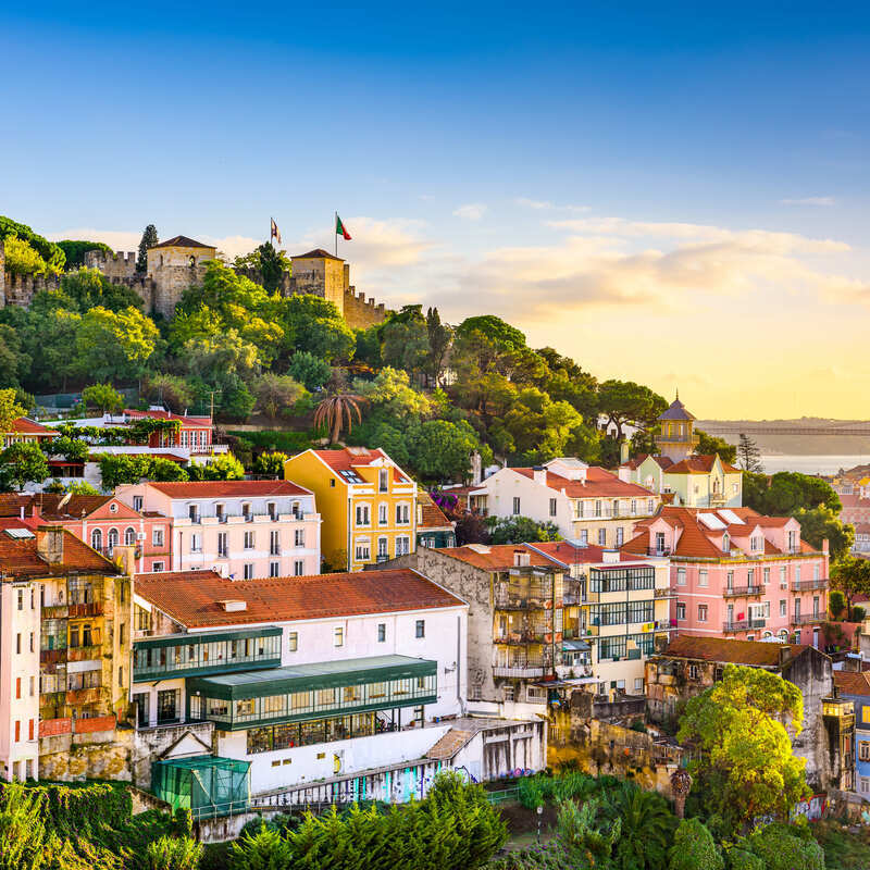 Lisbon Cityscape, Capital City Of Portugal, With The Atlantic Sea In The Distance, Western Europe