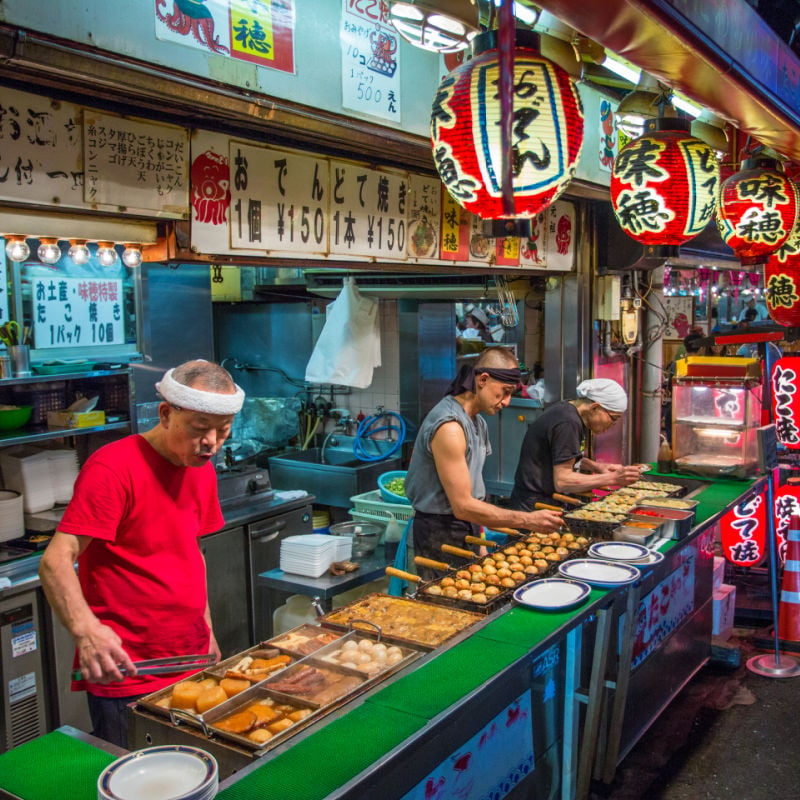 Street-Food-Being-Cooked-by-Japanese-Men-In-Osaka