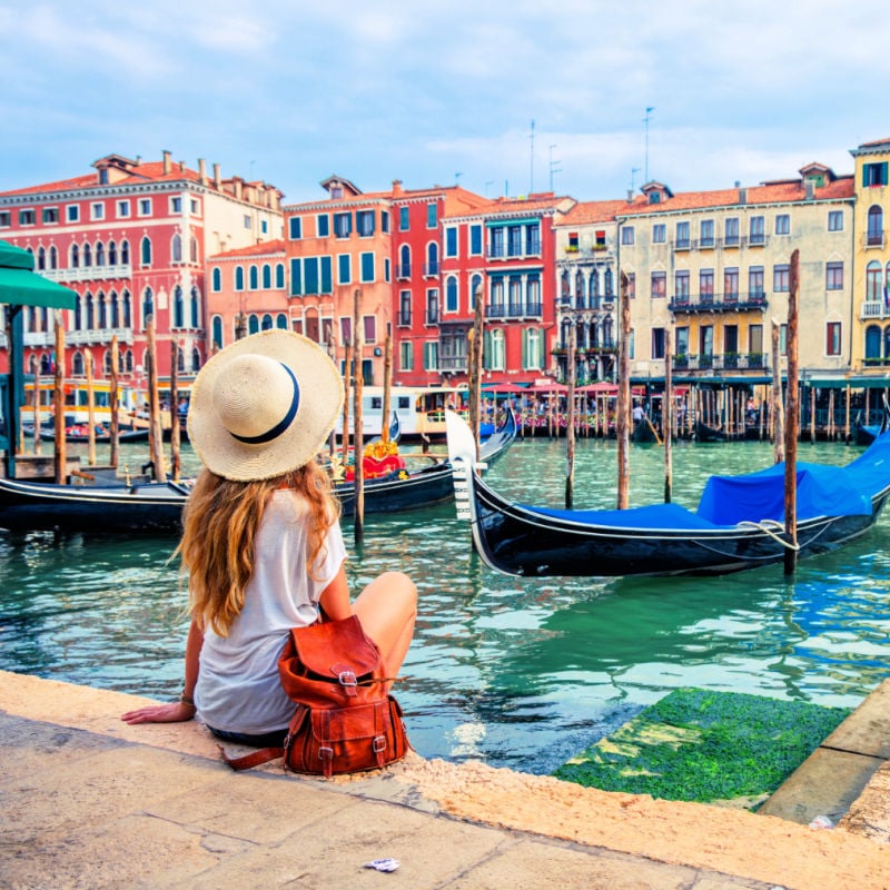 Young female tourist enjoyment Venice city- travel, tour tourism in Europe