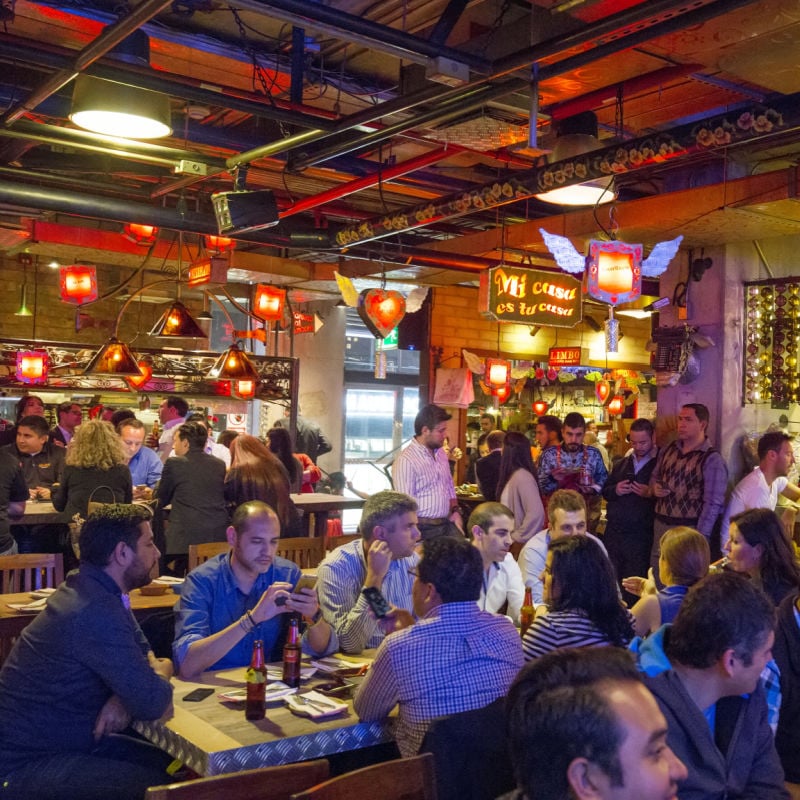 people in a bar:restaurant in bogota, colombia