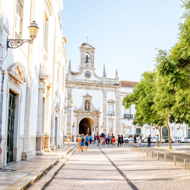 View on the park with Cidade arch in the old town of Faro on the south of Portugal