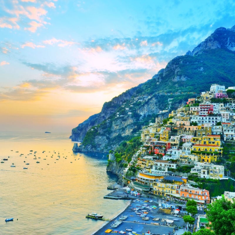 view of pretty colored buildings on the hill at positano on the amalfi coast in italy