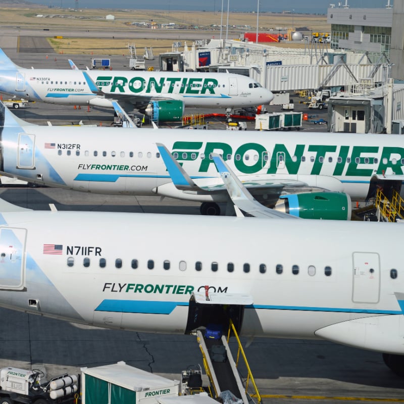 View of Frontier planes at an airport