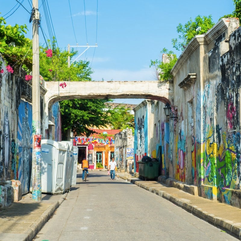 Street with colorful murals in Getsemani, Cartagena Colombia