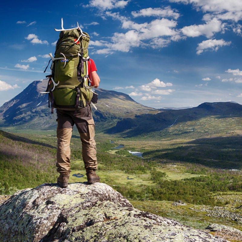 Solo hiker in Northern Sweden wilderness