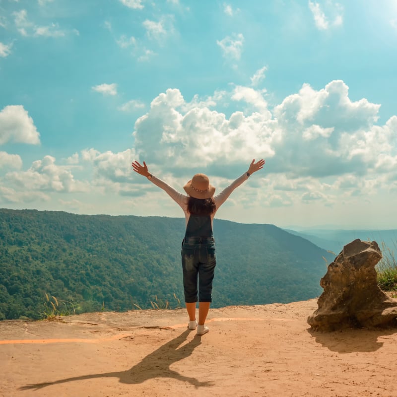 Woman enjoying views at Pa Deo Die Cliff