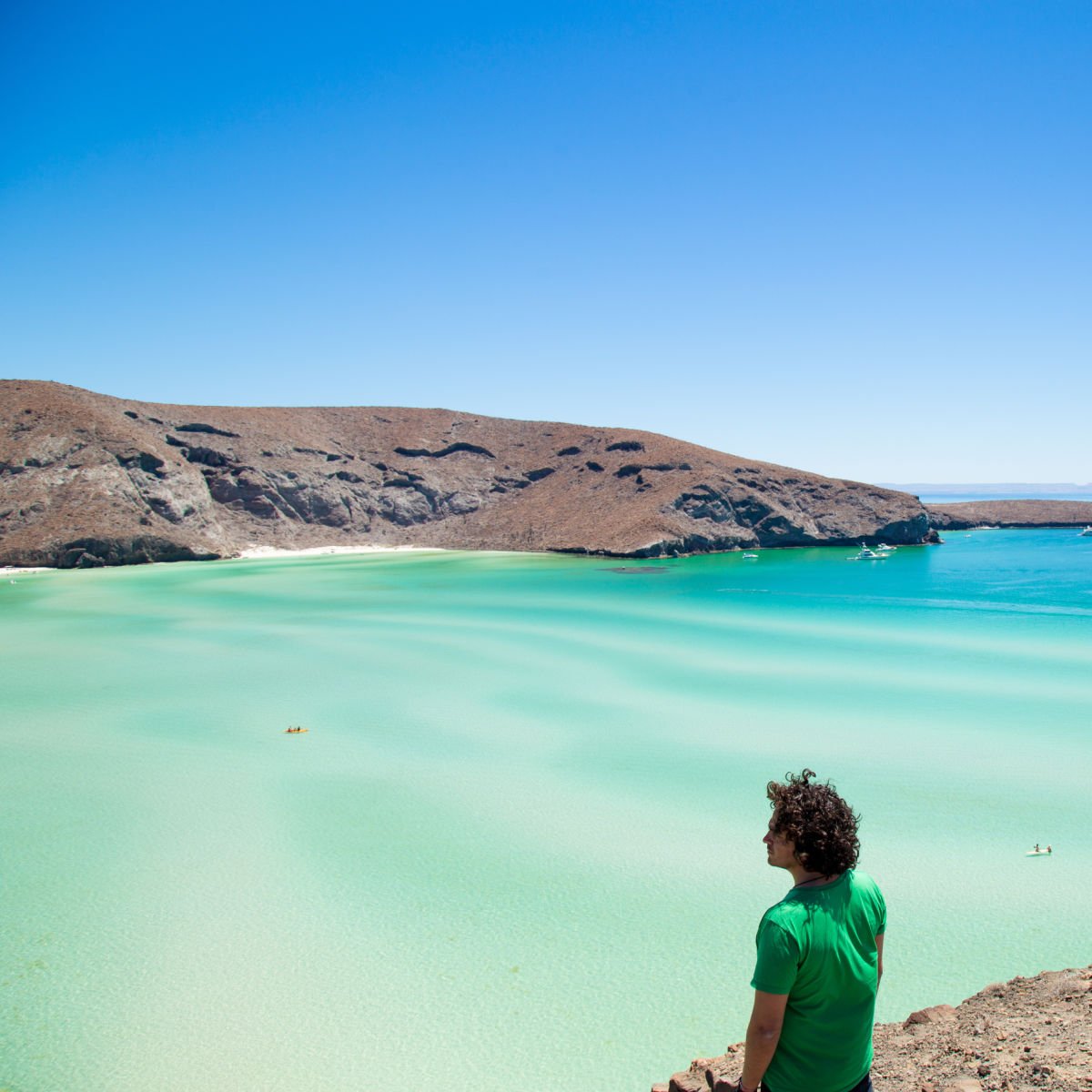 Man looking out at Balandra Beach