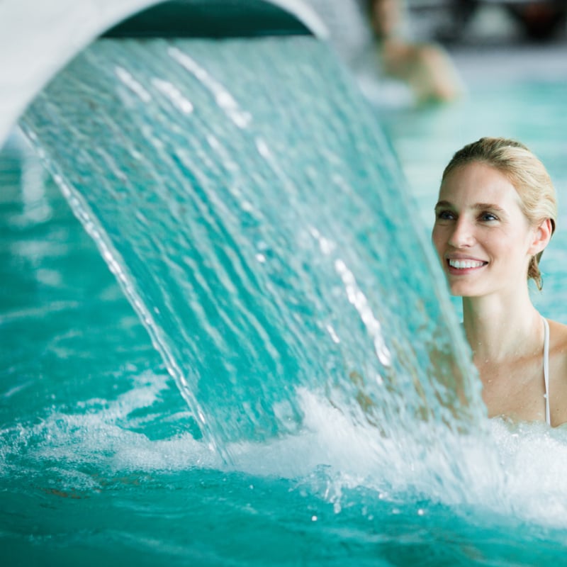 Woman In A Resort Pool