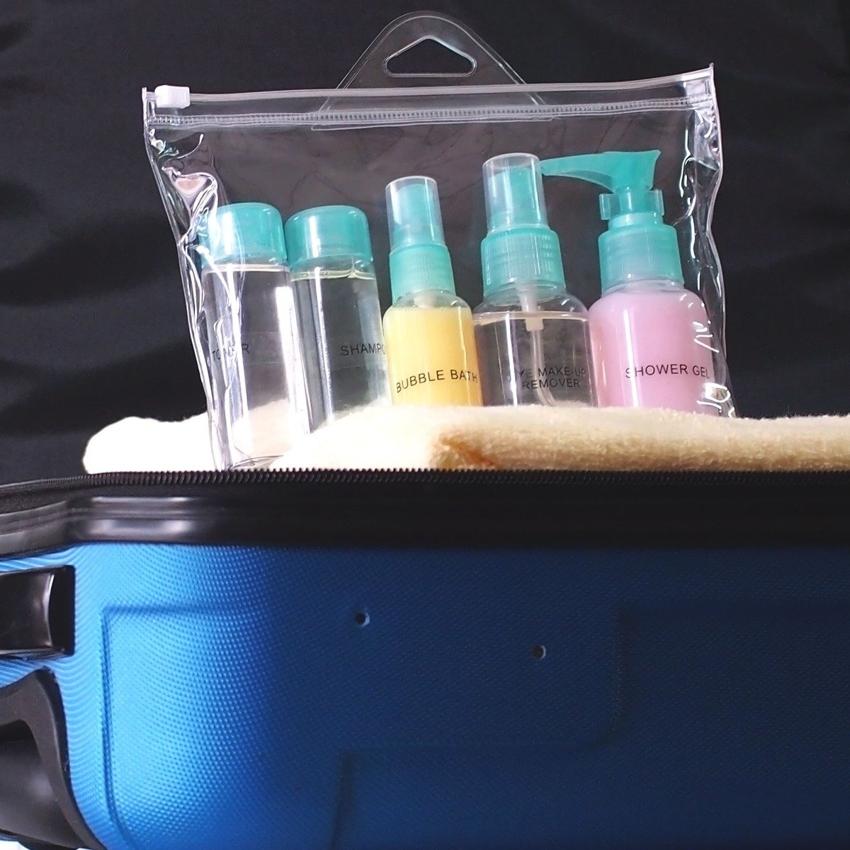 Liquids Being Packed Into A Hold Luggage At The Airport