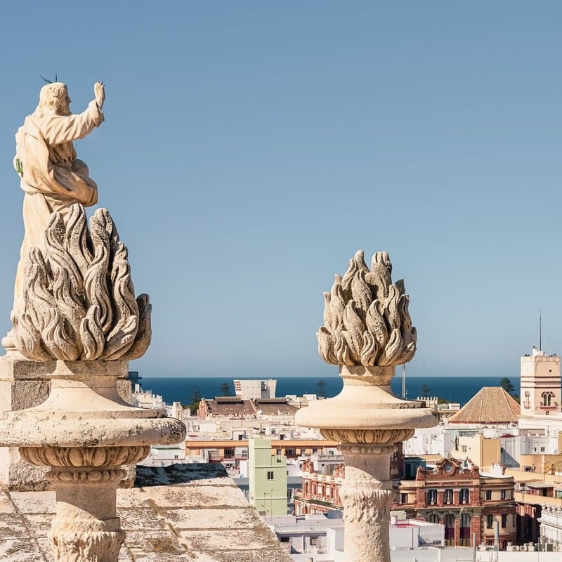 Sculptures Perched Atop Cadiz Cathedral In Spain