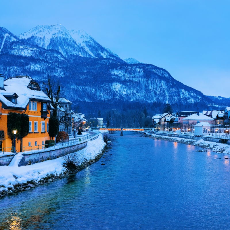 Bad Ischl, Austria. View of the river in the winter with mountains in the background