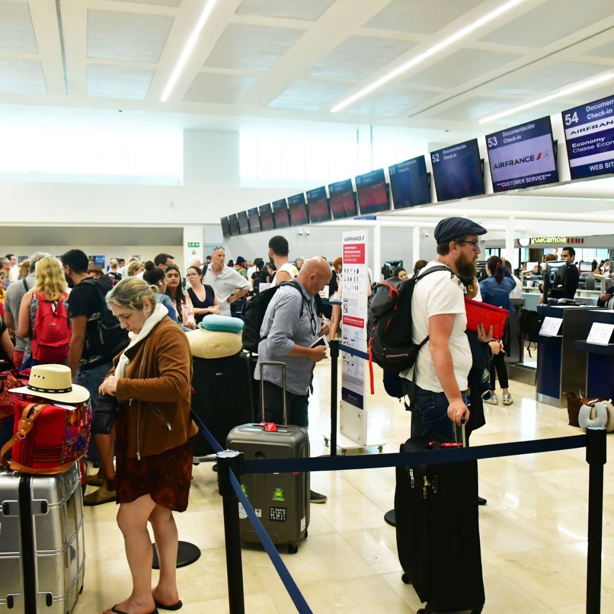 Passengers in the airport in Cancun