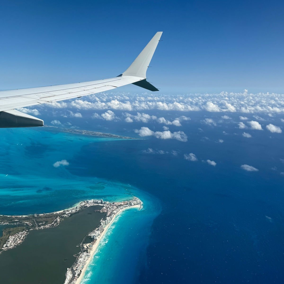 View of Cancun from an airplane wing